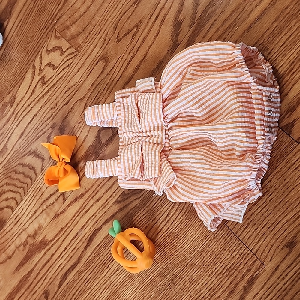 3/6 month baby girl seersucker bubble suit. With teether and bow.